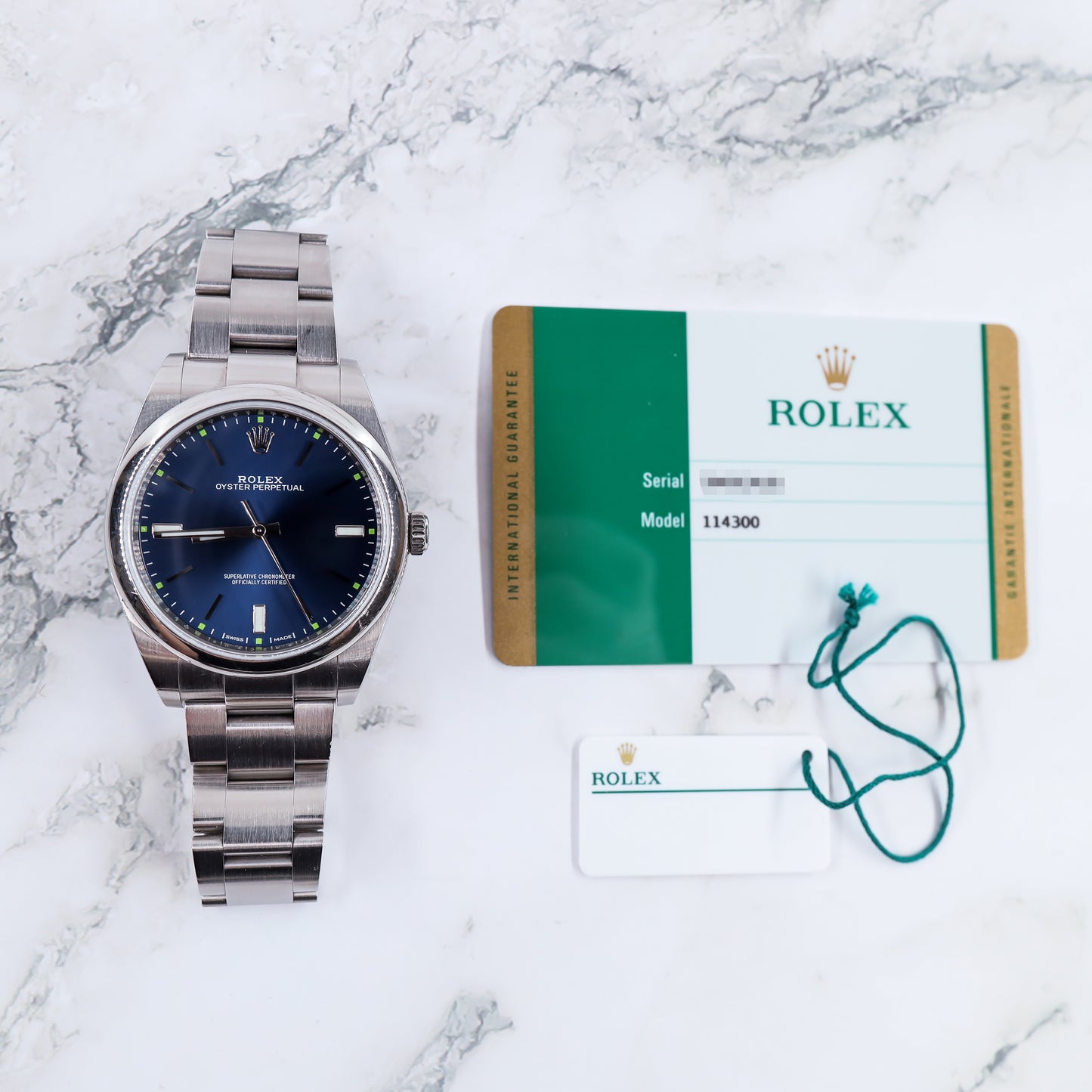 Rolex Oyster Perpetual 114300 with Card