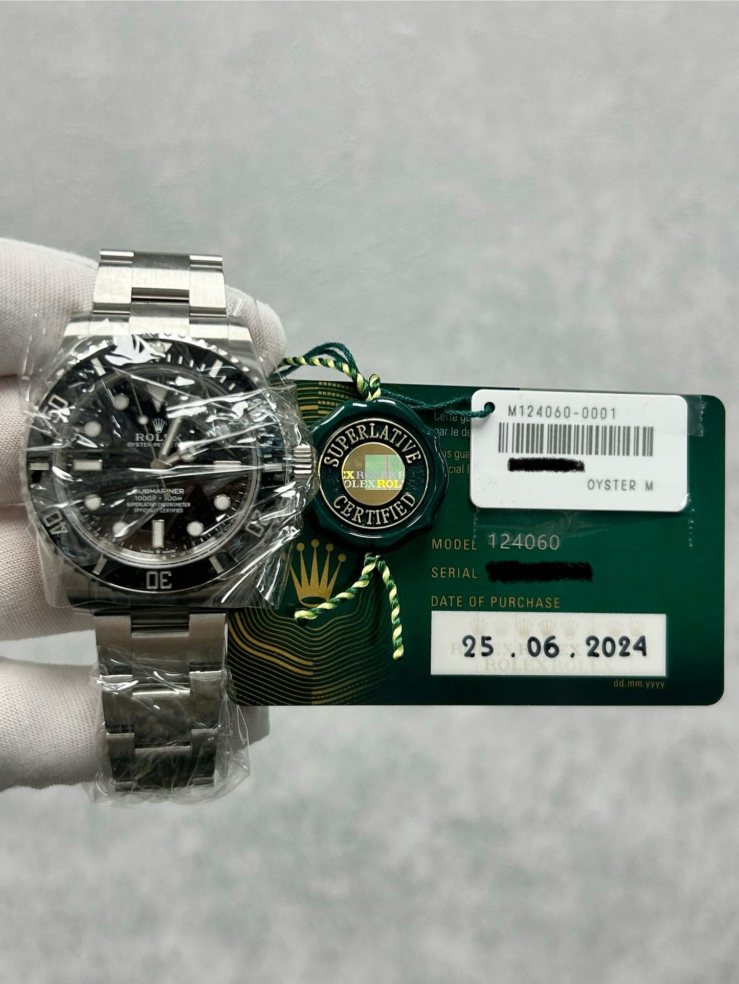 Rolex Submariner Date 124060 with Card