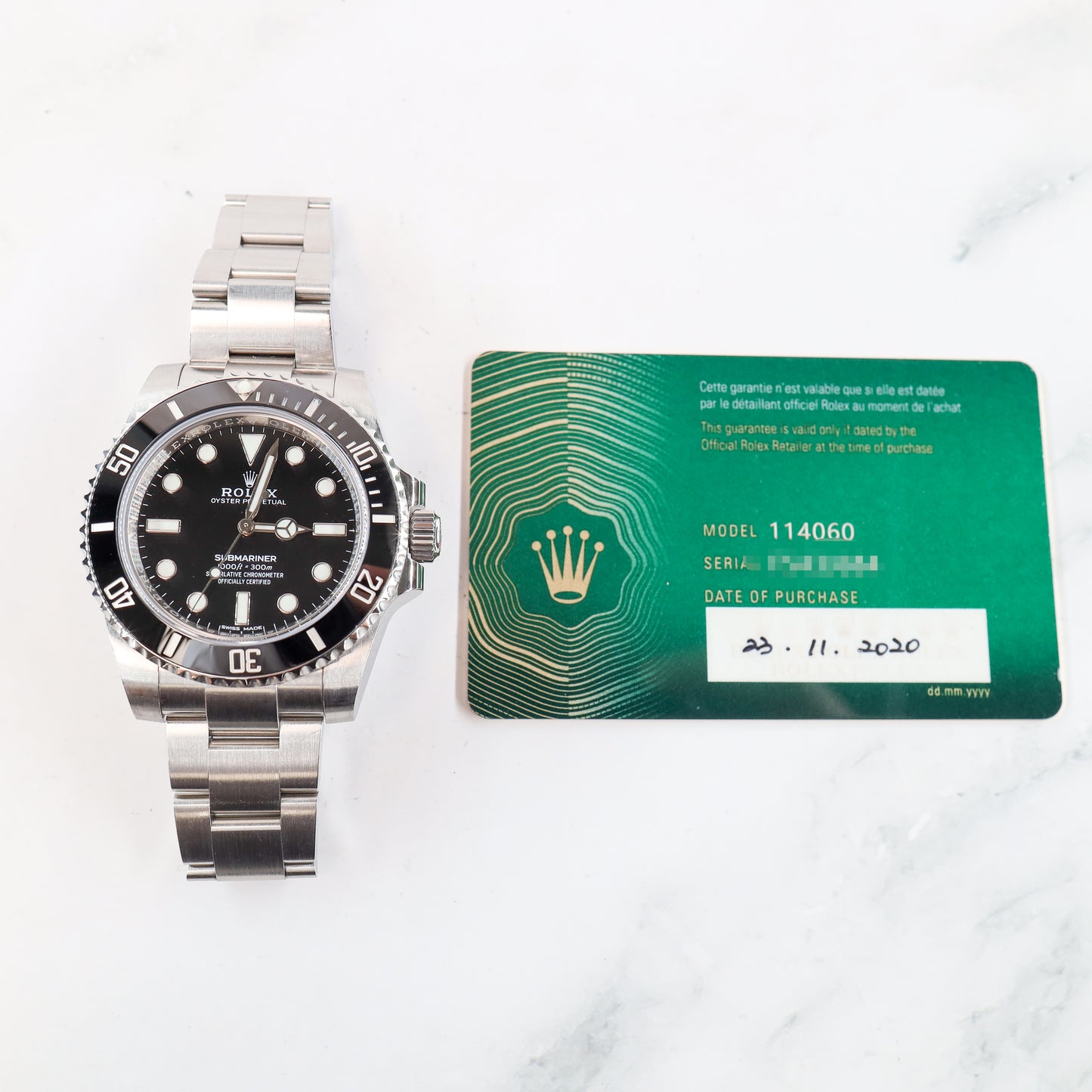 Rolex Submariner 114060 with Card