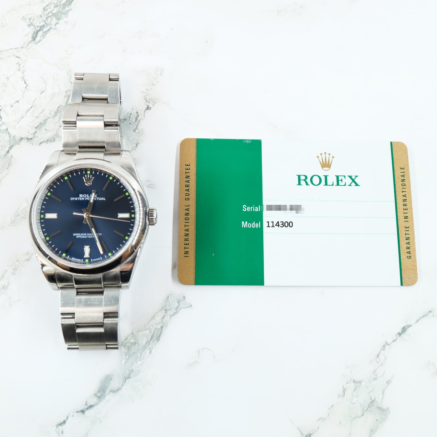 Rolex Oyster Perpetual 114300 with Card