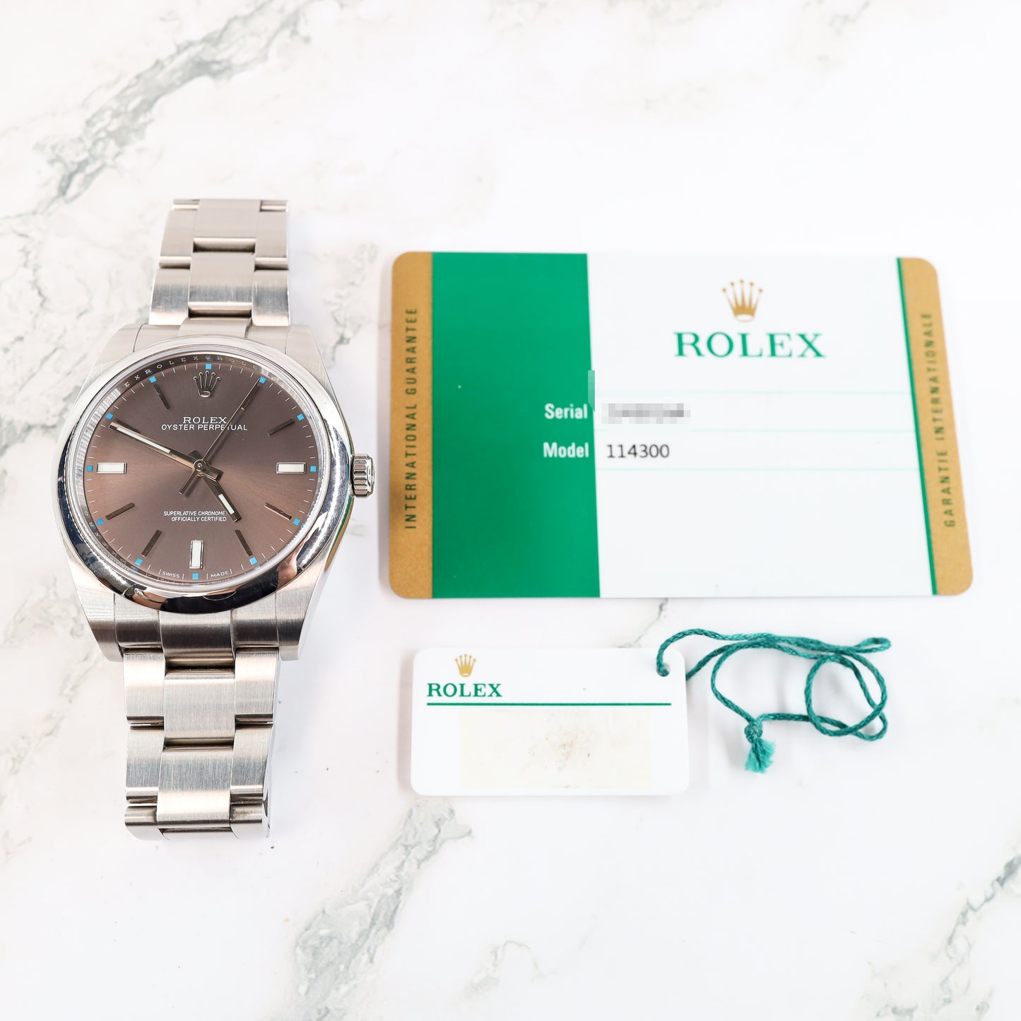 Rolex Oyster Perpetual 114300 with Card