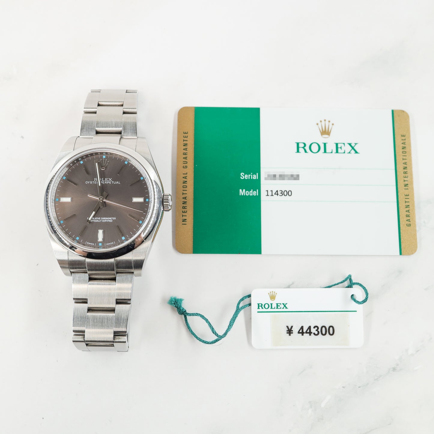 Rolex Oyster Perpetual 114300 with Card