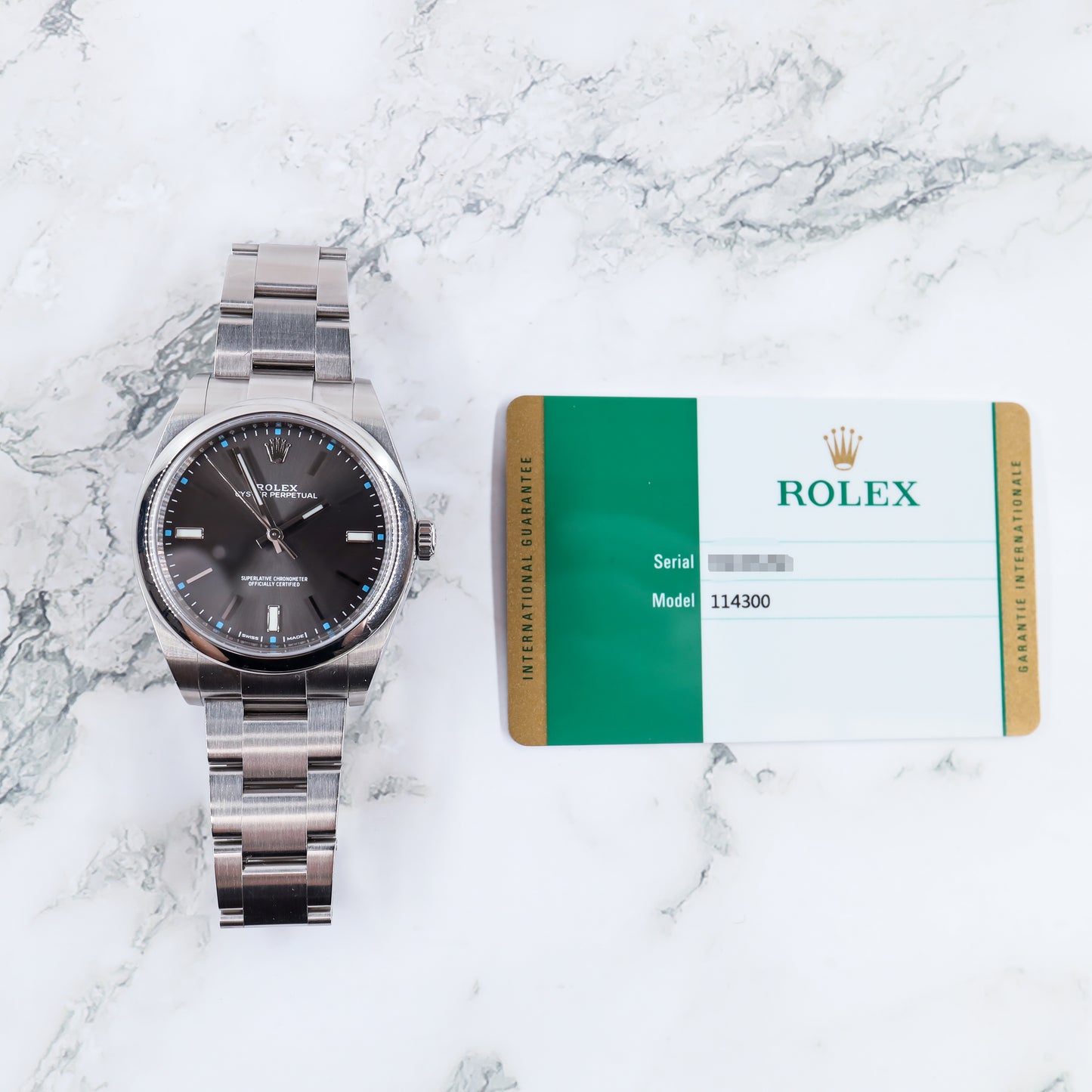 Rolex Oyster Perpetual 114300 with Card