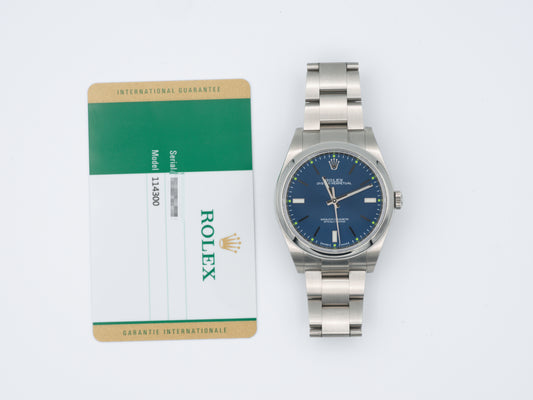 Rolex Oyster Perpetual 114300 with Card