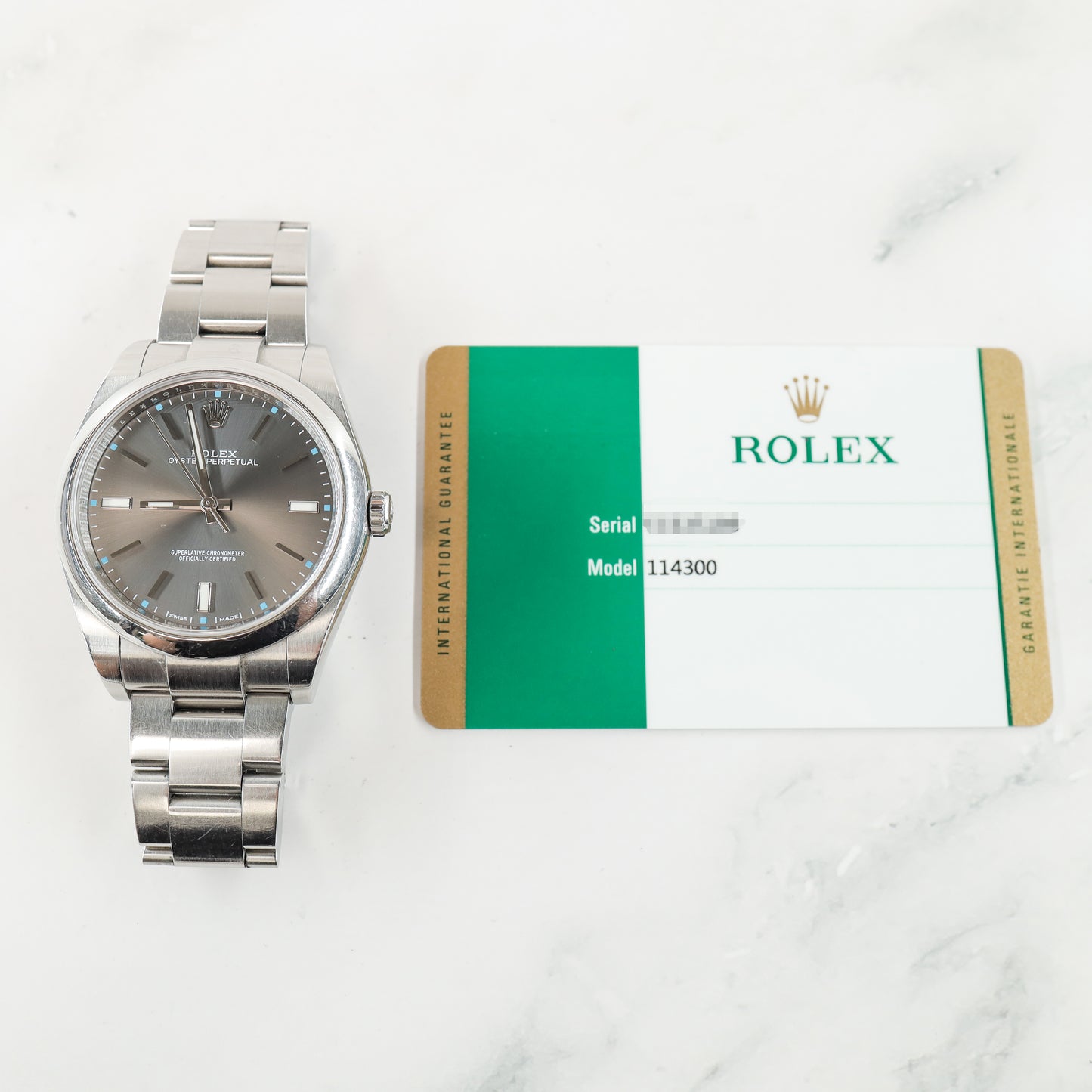 Rolex Oyster Perpetual 114300 with Card