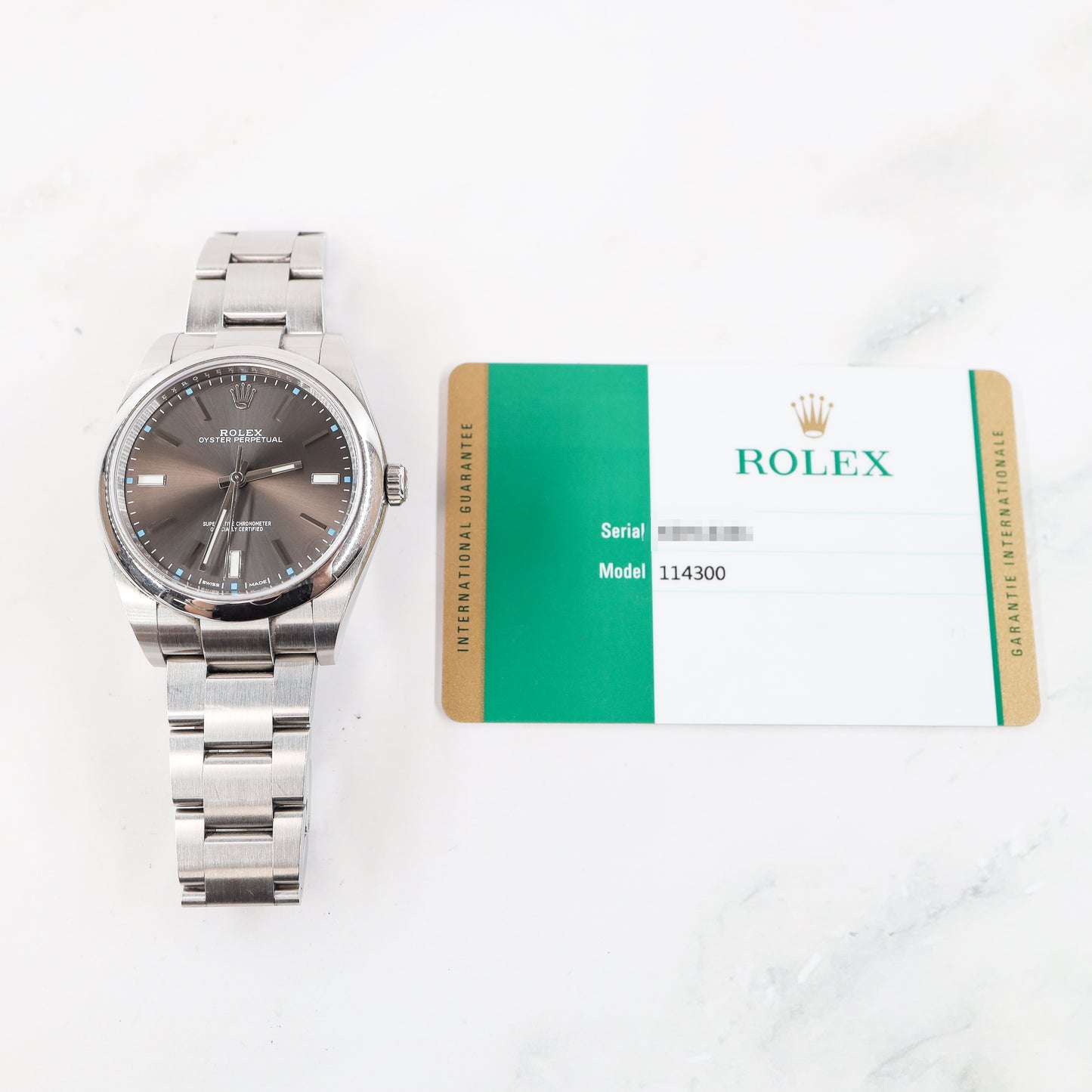 Rolex Oyster Perpetual 114300 with Card