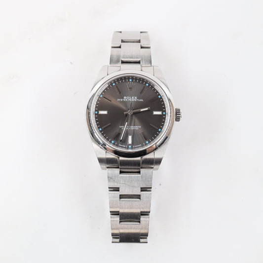 Rolex Oyster Perpetual 114300 with Card