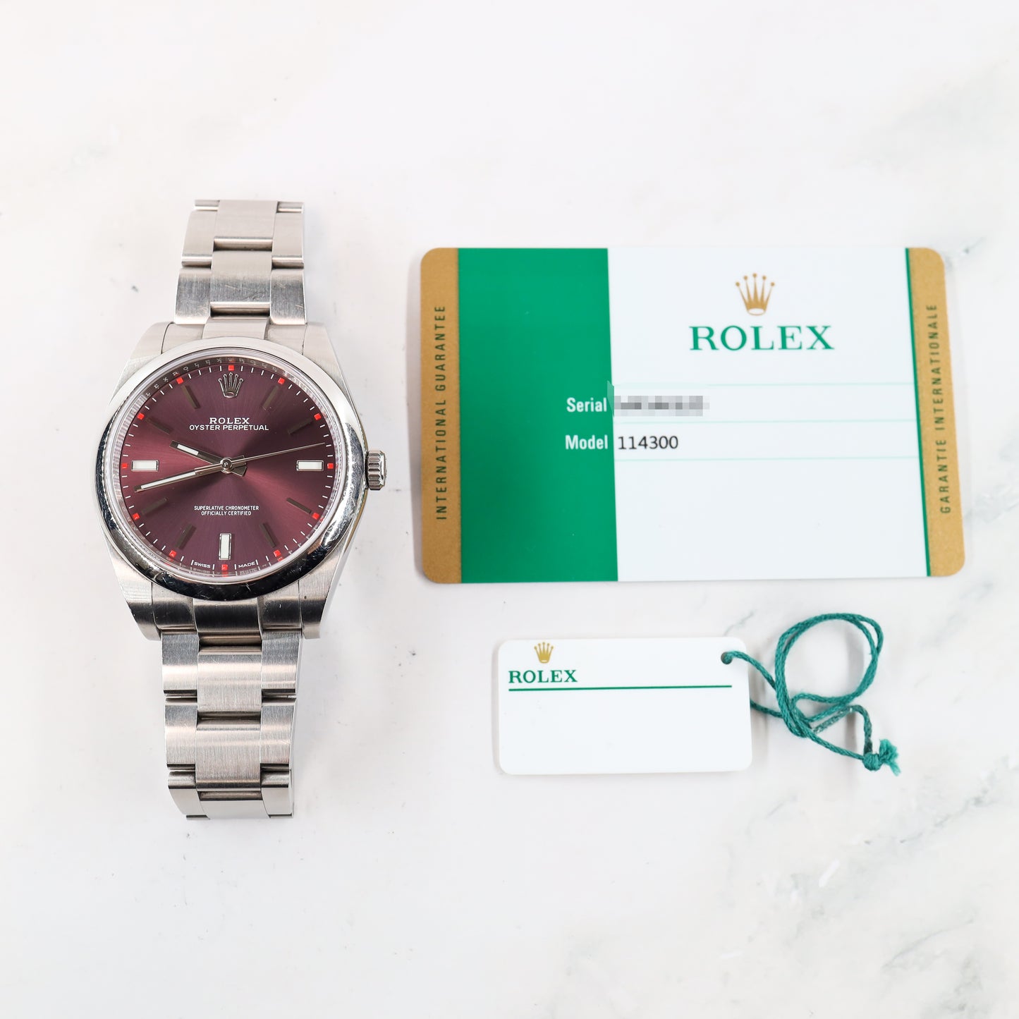 Rolex Oyster Perpetual 114300 with Card