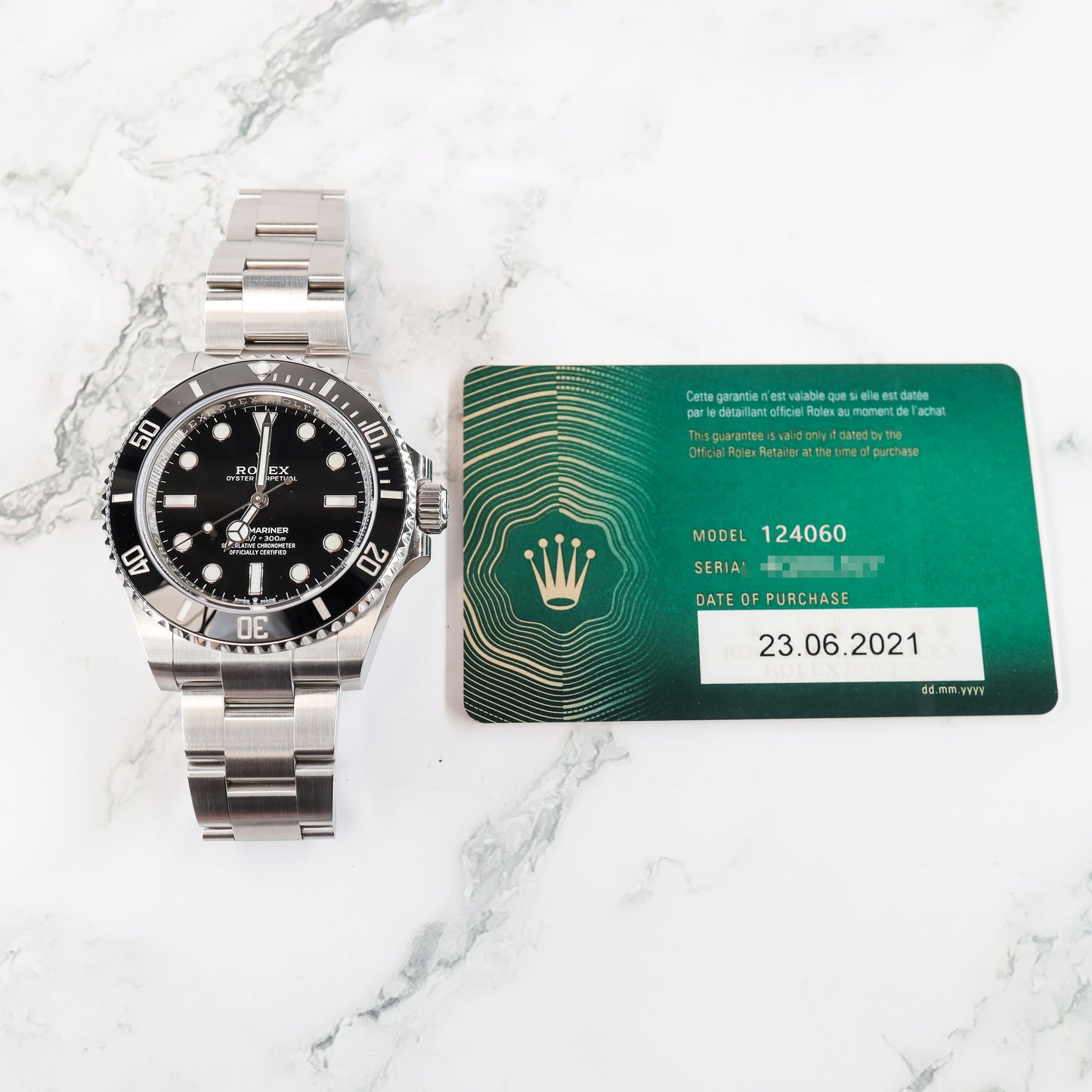 Rolex Submariner 124060 with Card