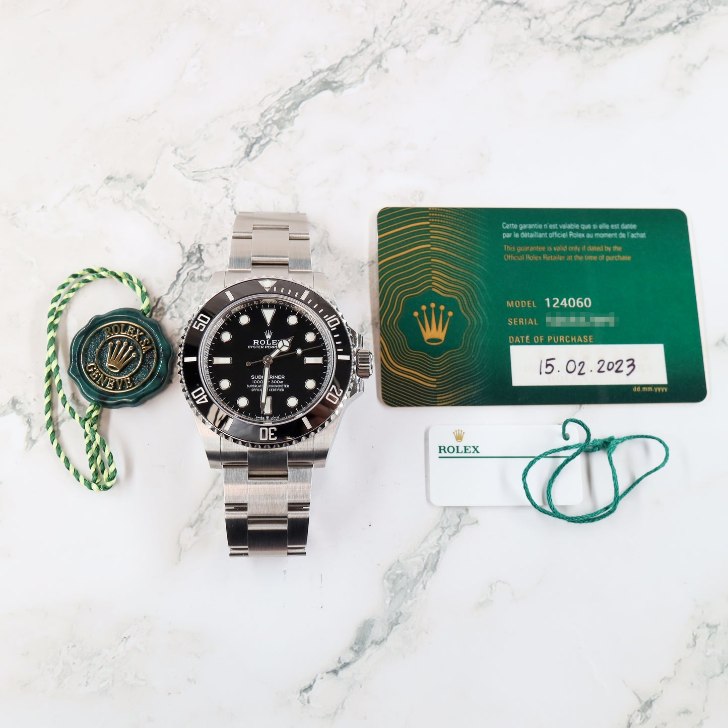 Rolex Submariner 124060 with Card