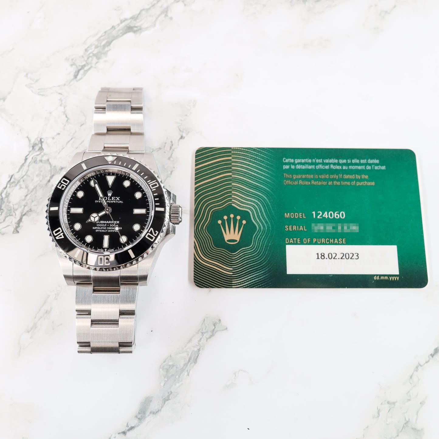 Rolex Submariner 124060 with Card