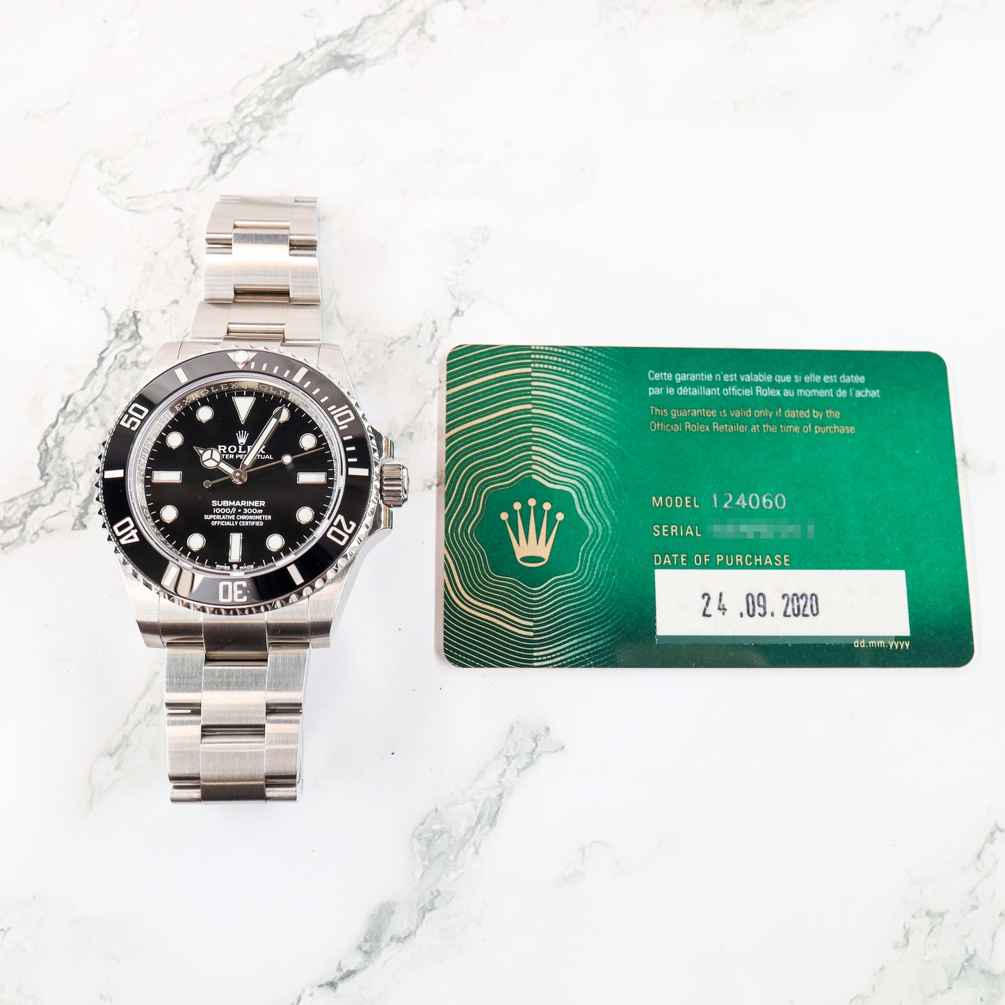 Rolex Submariner 124060 with Card