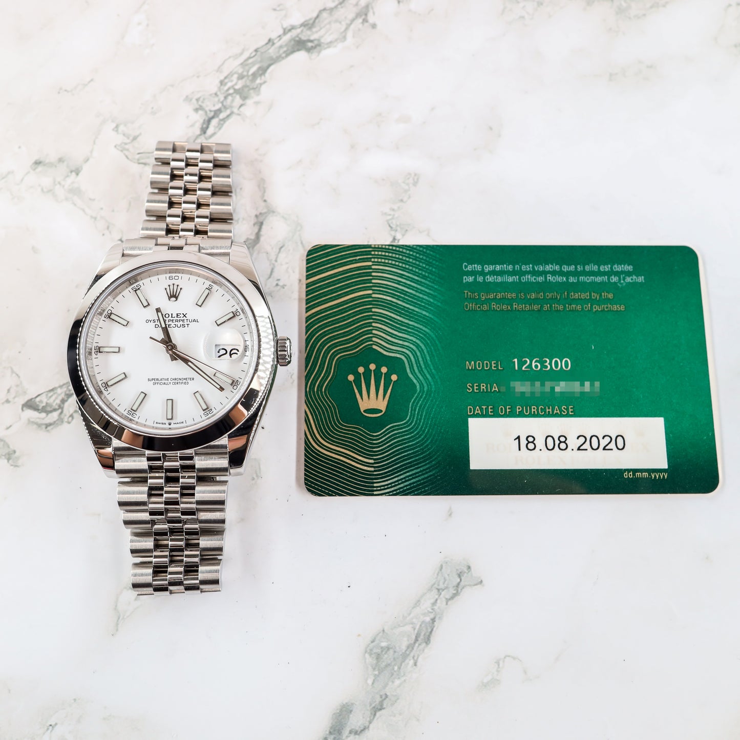 Rolex Date 126300 with Card