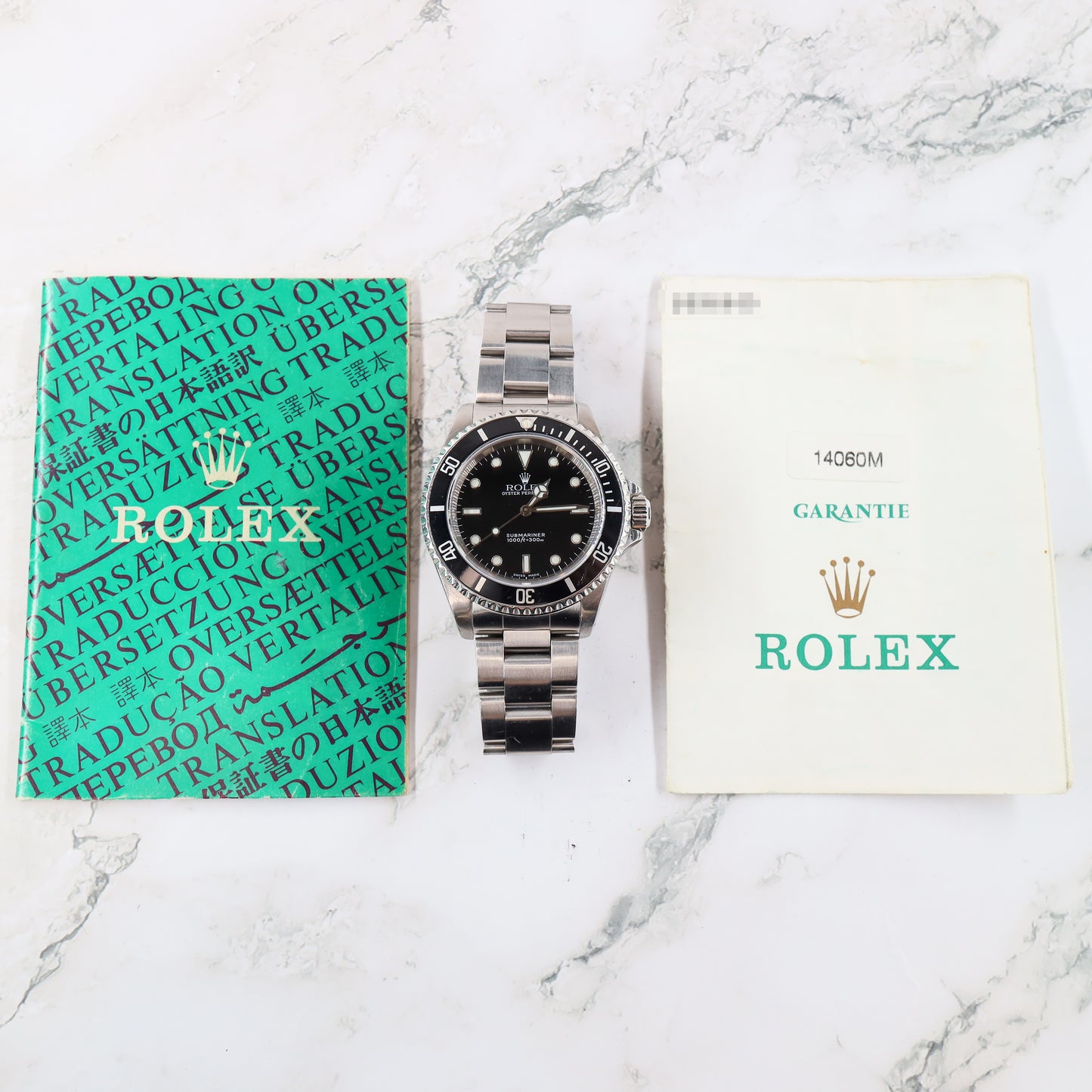 Rolex Submariner 14060M with Paper