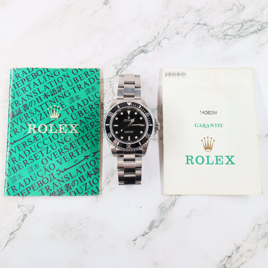 Rolex Submariner 14060M with Paper