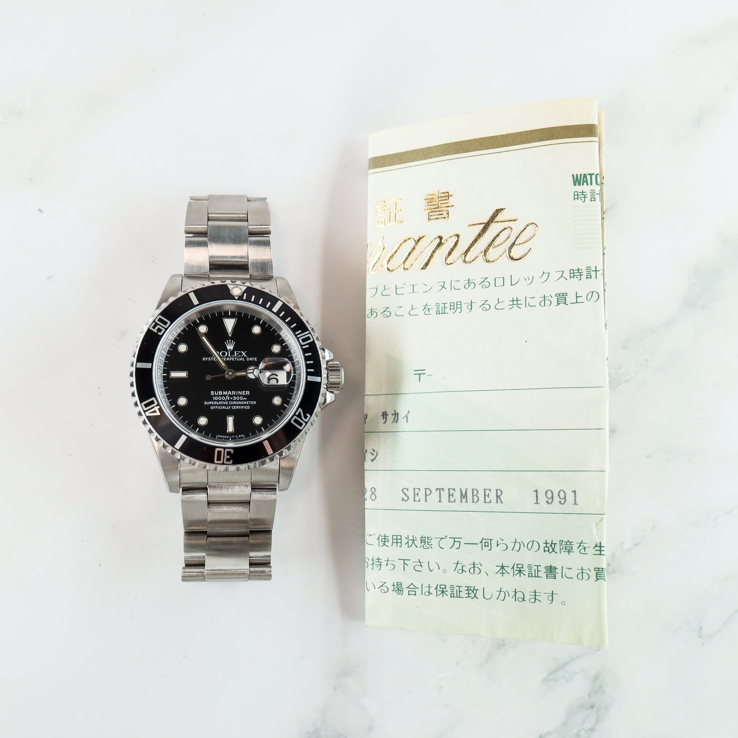 Rolex Submariner 16610 with Paper