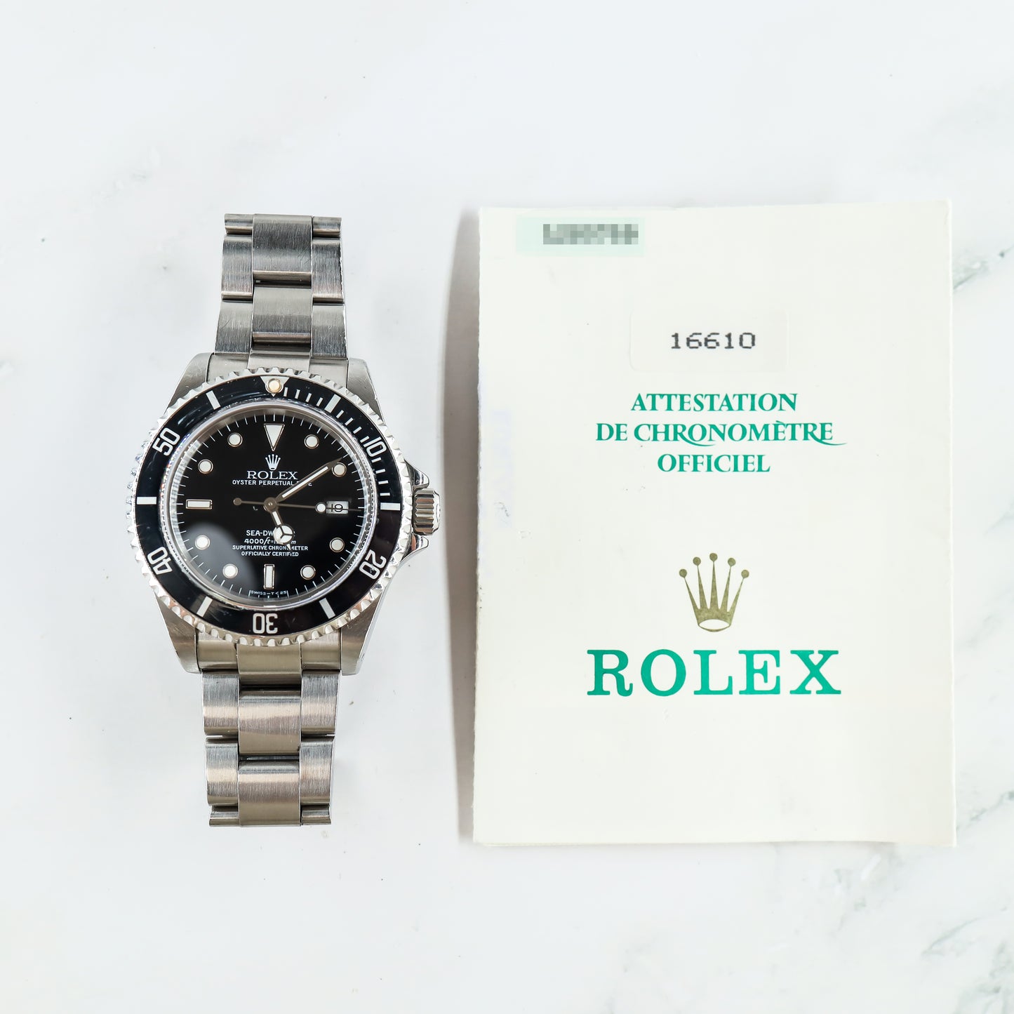 Rolex Sea Dweller 16610 with Paper